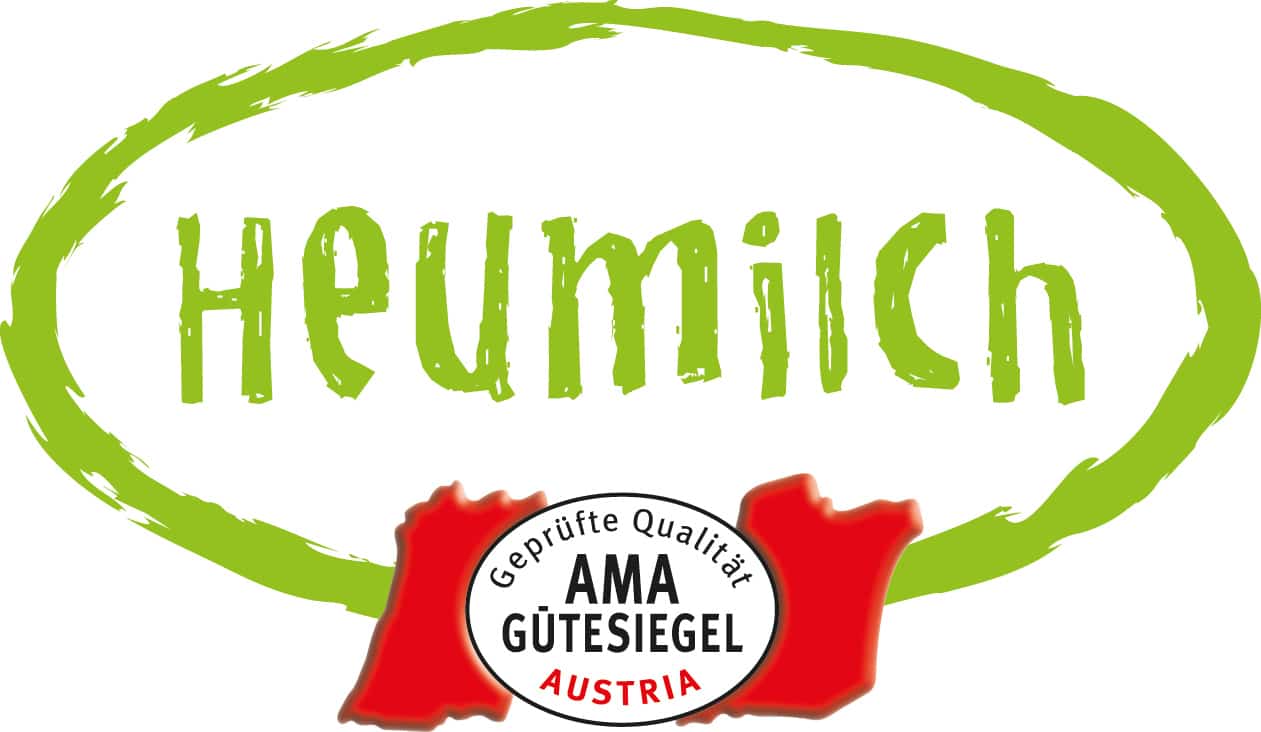 Heumilch-Logo – Symbol für traditionelle Alpenmilchwirtschaft und hochwertige Käseherstellung